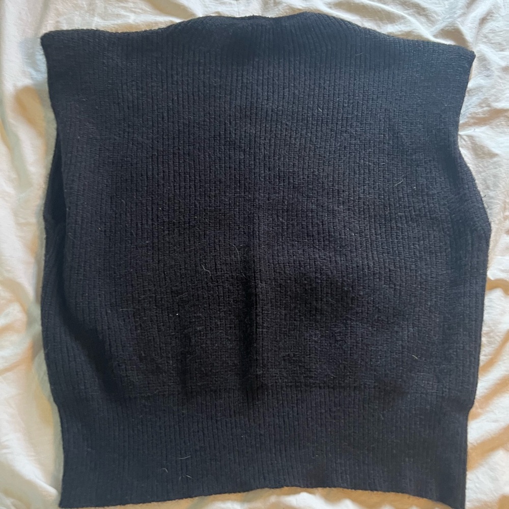 Black vest with shoulder pads